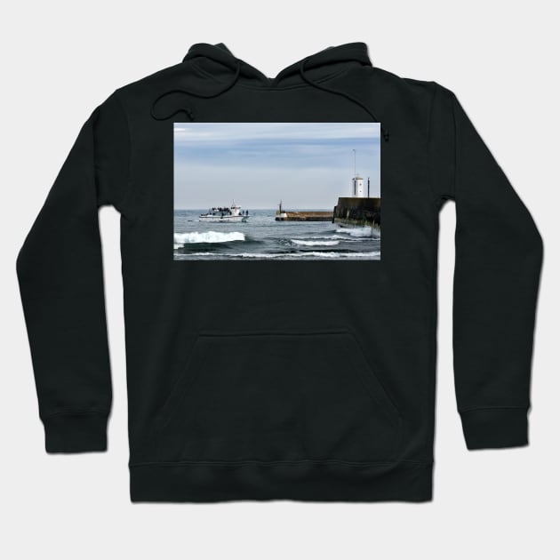 Tour boat returning from the Farne Islands to harbour, Northumberland, UK Hoodie by richflintphoto